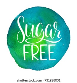sugar free calligraphy.  hand drawn label. sugar free sign on a blue and green watercolor background