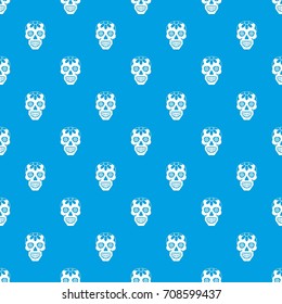 Sugar skull, flowers on the skull pattern repeat seamless in blue color for any design. Vector geometric illustration