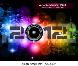 Suggestive 2012 New Year Celebration Background with Glitter and Rainbow Colours ideal for nightlife music event posters.