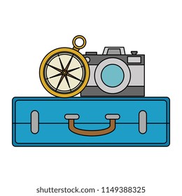 suitcase with camera and compass