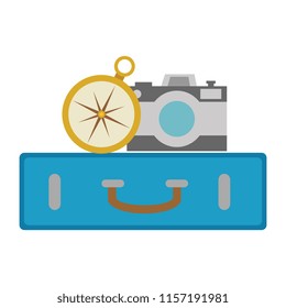 suitcase with camera and compass