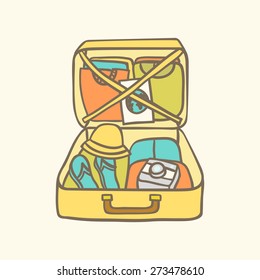 Suitcase with clothes, flip flops, camera and guide.