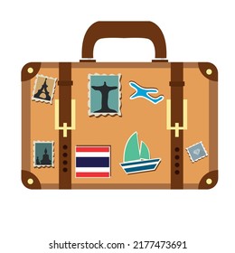 Suitcase decorated with stickers vector