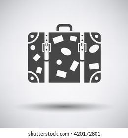 Suitcase icon on gray background with round shadow. Vector illustration.