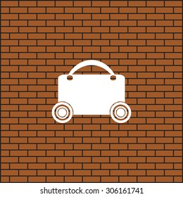 suitcase on wheels. icon. vector design