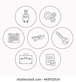 Suitcase on wheels, key and airplane icons. Briefcase linear sign. Check file, calendar and cogwheel icons. Vector