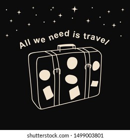 Suitcase with stickers on the background of the starry sky