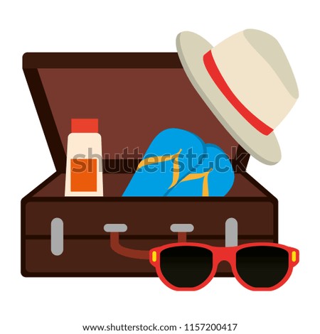 suitcase with summer hat and sunglasses