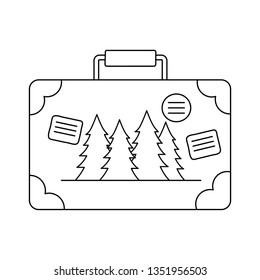suitcase travel with pines forest