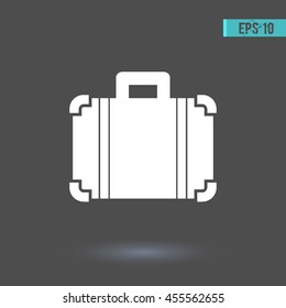 Suitcase vector icon. Graphic symbol for web design, logo. White glyph on a gray background. Isolated sign.