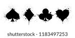 The suits of the deck of playing cards on background of splashing. Vector illustration.