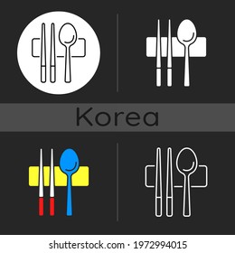 Sujeo dark theme icon. Metal chopsticks. Spoon for eating. Oriental tableware. Eastern cutlery. Korean culture. Linear white, simple glyph and RGB color styles. Isolated vector illustrations