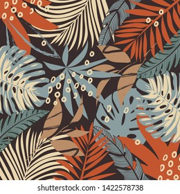 Summer abstract pattern with bright tropical leaves and plants on a brown background. Vector design. Jung print. Floral background. Printing and textiles.