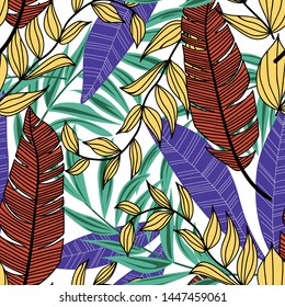 Summer abstract seamless pattern with colorful tropical leaves and plants on white background. Vector design. Jungle print. Floral background. Printing and textiles. Exotic tropics. Fresh design.