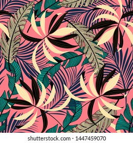 Summer abstract seamless pattern with colorful tropical leaves and plants on pink background. Vector design. Jungle print. Floral background. Printing and textiles. Exotic tropics. Fresh design.