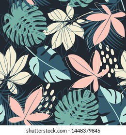 Summer abstract seamless pattern with colorful tropical leaves and plants on a dark background. Vector design. Jungle print. Floral background. Printing and textiles. Exotic tropics. Fresh design.