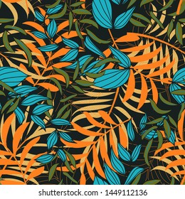 Summer abstract seamless pattern with colorful tropical leaves and plants on a dark background. Vector design. Jungle print. Floral background. Printing and textiles. Exotic tropics. Fresh design.