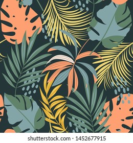 Summer abstract seamless pattern with colorful tropical leaves and plants on blue background. Vector design. Jungle print. Floral background. Printing and textiles. Exotic tropics. Fresh design.