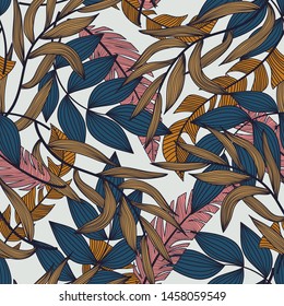 Summer abstract seamless pattern with colorful tropical leaves and plants on white background. Vector design. Jungle print. Flowers background. Printing and textiles. Exotic tropics. Fresh design.