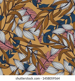 Summer abstract seamless pattern with colorful tropical leaves and plants on orange background. Vector design. Jungle print. Flowers background. Printing and textiles. Exotic tropics. Fresh design.
