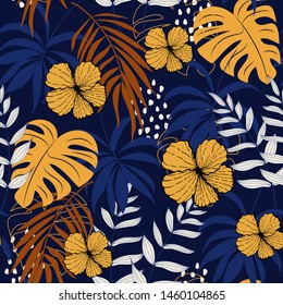 Summer abstract seamless pattern with colorful tropical leaves and flowers on a dark background. Vector design. Jungle print. Flowers background. Printing and textiles. Exotic tropics. Fresh design.