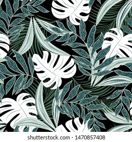 Summer abstract seamless pattern with colorful tropical leaves and plants on a dark background. Vector design. Jungle print. Floral background. Printing and textiles. Exotic tropics. Summer design.
