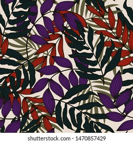 Summer abstract seamless pattern with colorful tropical leaves and flowers on a delicate background. Vector design. Jungle print. Floral background. Printing and textiles. Exotic tropics. Summer desig