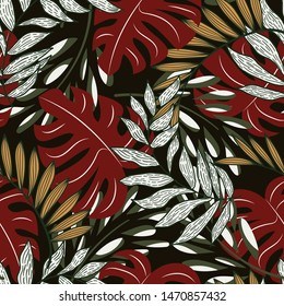 Summer abstract seamless pattern with colorful tropical leaves and plants on a dark background. Vector design. Jungle print. Floral background. Printing and textiles. Exotic tropics. Summer design.