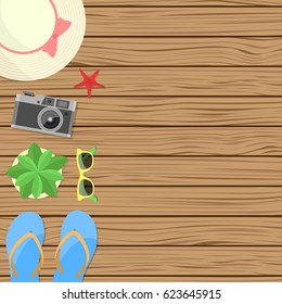 Summer accessories on wooden table. Vector illustration.