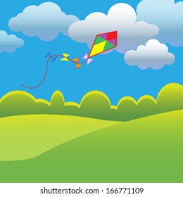 Summer background with kite and clouds.