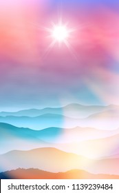 Summer background with mountains in the fog