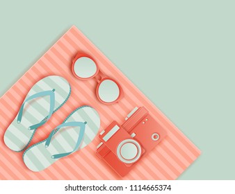 Summer background in pastel colors. Paper cut retro photo camera, sunglasses, striped beach towel, slippers. Summer vacation concept