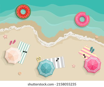 Summer beach resort panorama with colorful beach umbrellas, towels and swimming floats