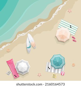 Summer beach resort panorama with colorful beach umbrellas, towels and surfboard 