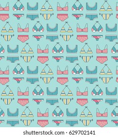 Summer beach seamless pattern. Vector bright background with swimsuits. Can be used for wallpaper, surface textures, scrapbooking, fabric prints.