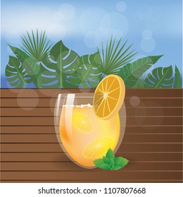 Summer beach  tea or juice on wood table with palms leafs and sea .