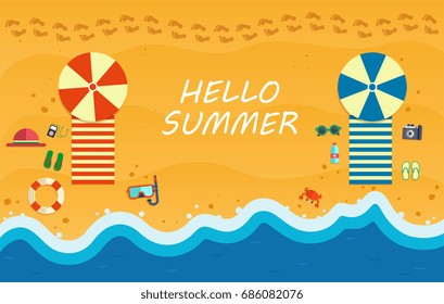 Summer beach with waves and beach accessories.