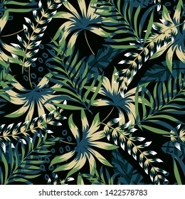 Summer bright original seamless pattern with tropical leaves and plants on a black background. Vector design. Jung print. Floral background. Printing and textiles.