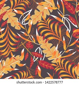 Summer bright seamless pattern with tropical leaves and plants on a dark background. Vector design. Jung print. Floral background. Printing and textiles.