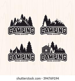 Summer camp badges logos and labels for any use, on wooden background texture
