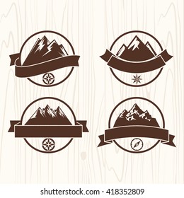 Summer camp badges logos and labels for any use, on wooden background texture