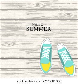 Summer canvas shoes with wood linear background 