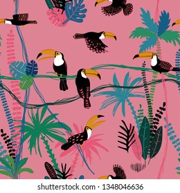 Summer colorful wildlife birds print. Seamless pattern with toucan in a wild jungle.