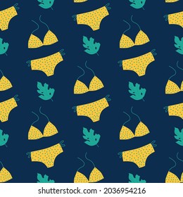 Summer cute pattern. Swimsuit and monstera on a dark blue background. Flat vector illustration