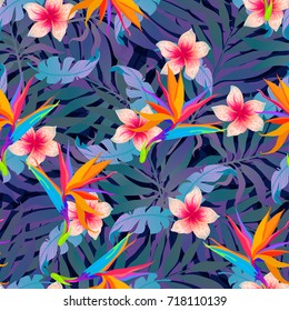 Summer exotic palm leaves and flowers background. Vector tropical abstract seamless pattern. Plant flower nature wallpaper