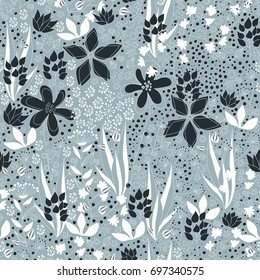 Summer field. A seamless pattern design with variety of flowers and herbs in the summer field.