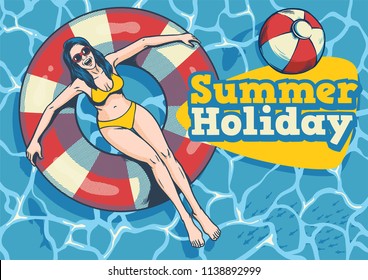 summer girl with float in the pool