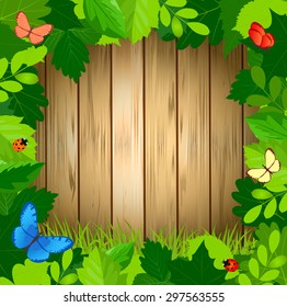 Summer green leaf frame with butterflies on wood surface