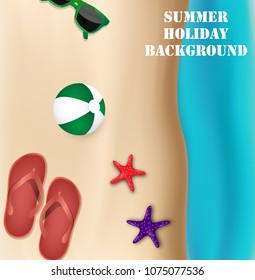 Summer Holiday background. Top view on beach ball, flipflop, starfish and sunglasses in the beach sandy