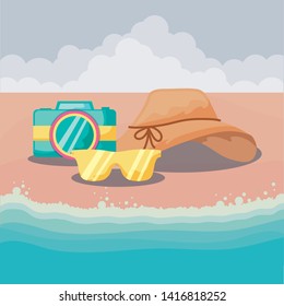 summer holiday with camera and accessories in beach